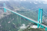 Huajiang Grand Canyon Bridge pictures, Huajiang Grand Canyon Bridge videos, china cuts travel of 2 hours to 2 mins with highest bridge, Grand